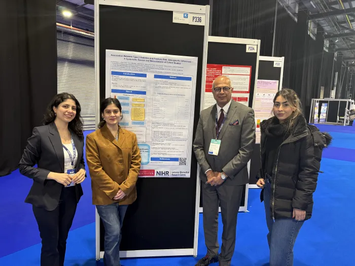 Sara standing next to her poster at Diabetes UK Professional Conference 2025